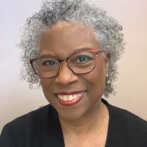 African-American woman with tortoiseshell glasses