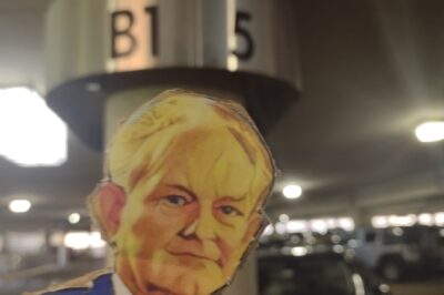 paper doll in a basement parking
